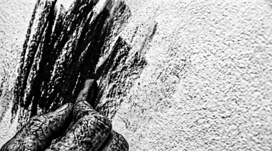 Abstract black and white brushstroke composition evoking monochromatic artistic power and symbolic gravity